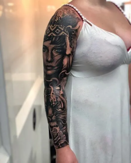 Black and grey full sleeve with a Native American warrior maiden, tiger and rose