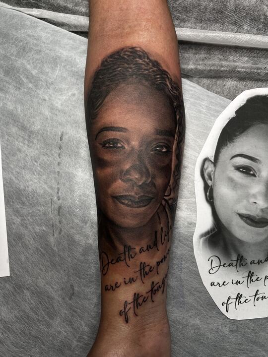 Portrait forearm tattoo