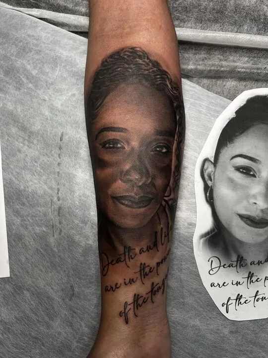Portrait forearm tattoo